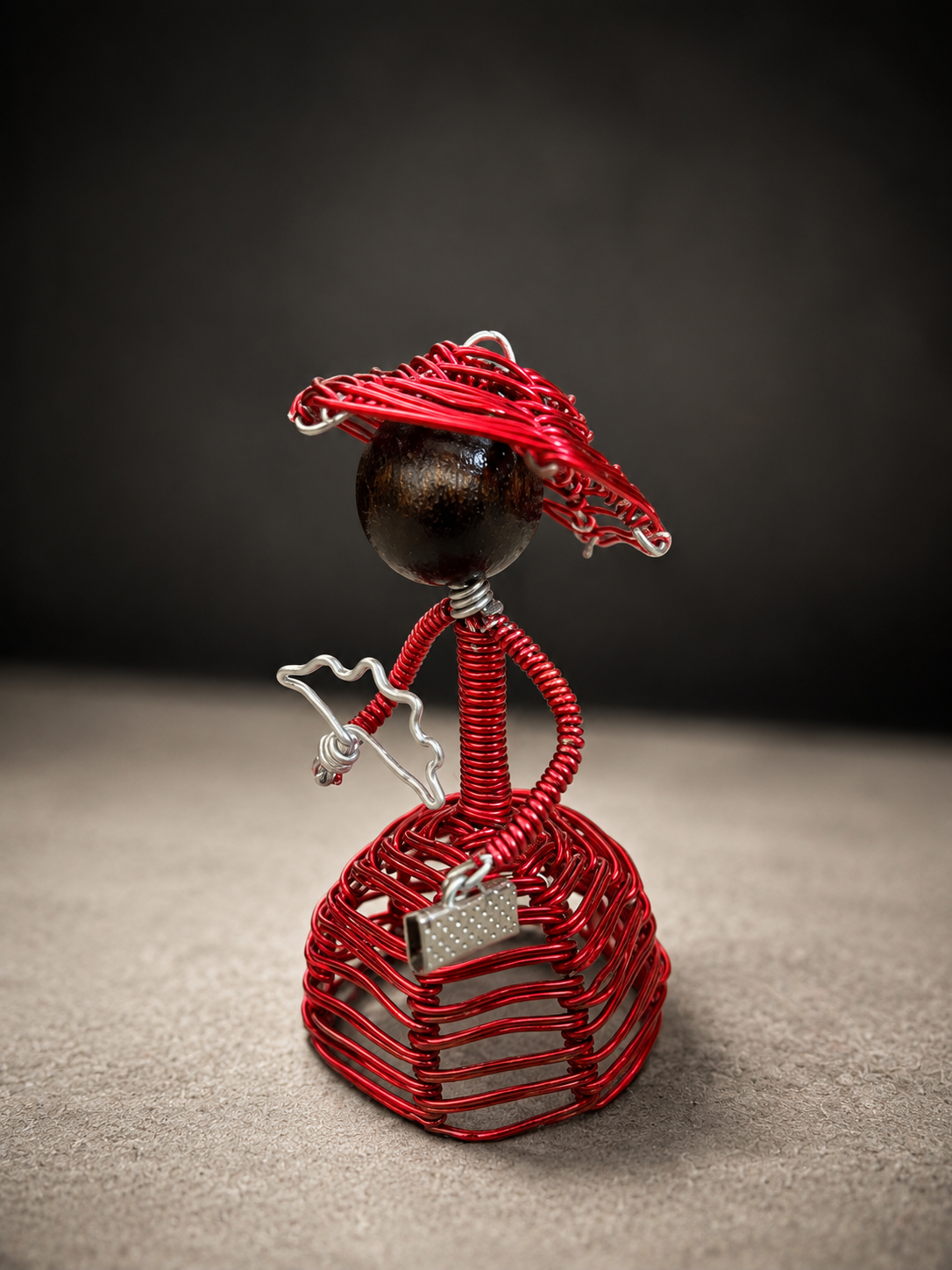 Edwardian-inspired wire sculpture figures with elegant vintage charm.”