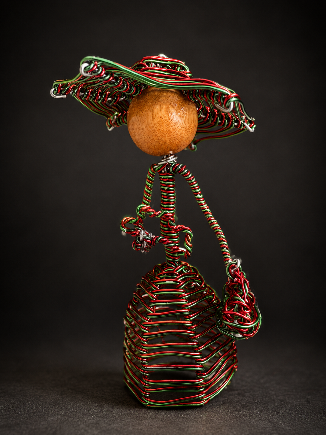 Edwardian-inspired wire sculpture figures with elegant vintage charm.”