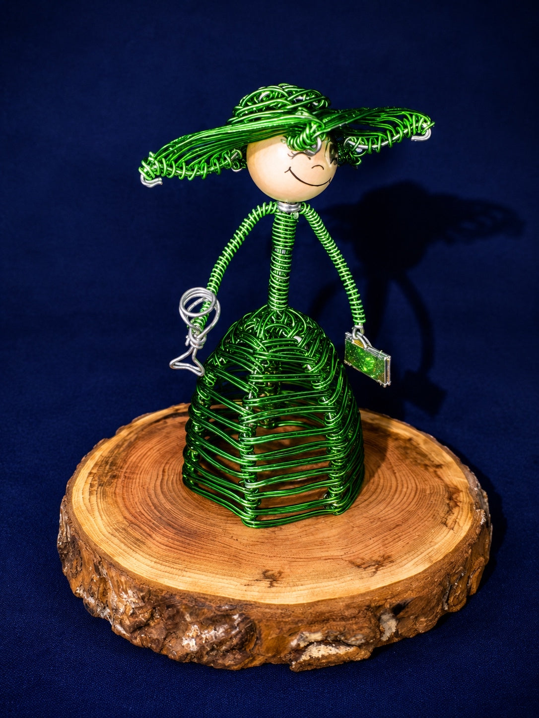 Edwardian-inspired wire sculpture figures with elegant vintage charm.”