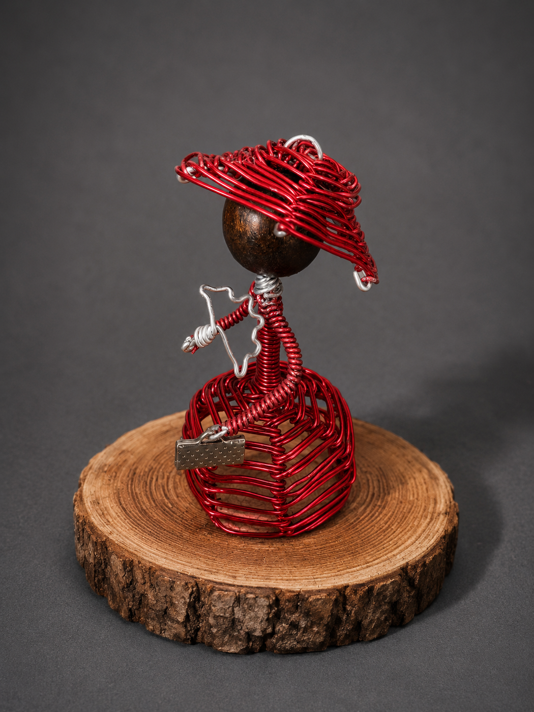 Edwardian-inspired wire sculpture figures with elegant vintage charm.”