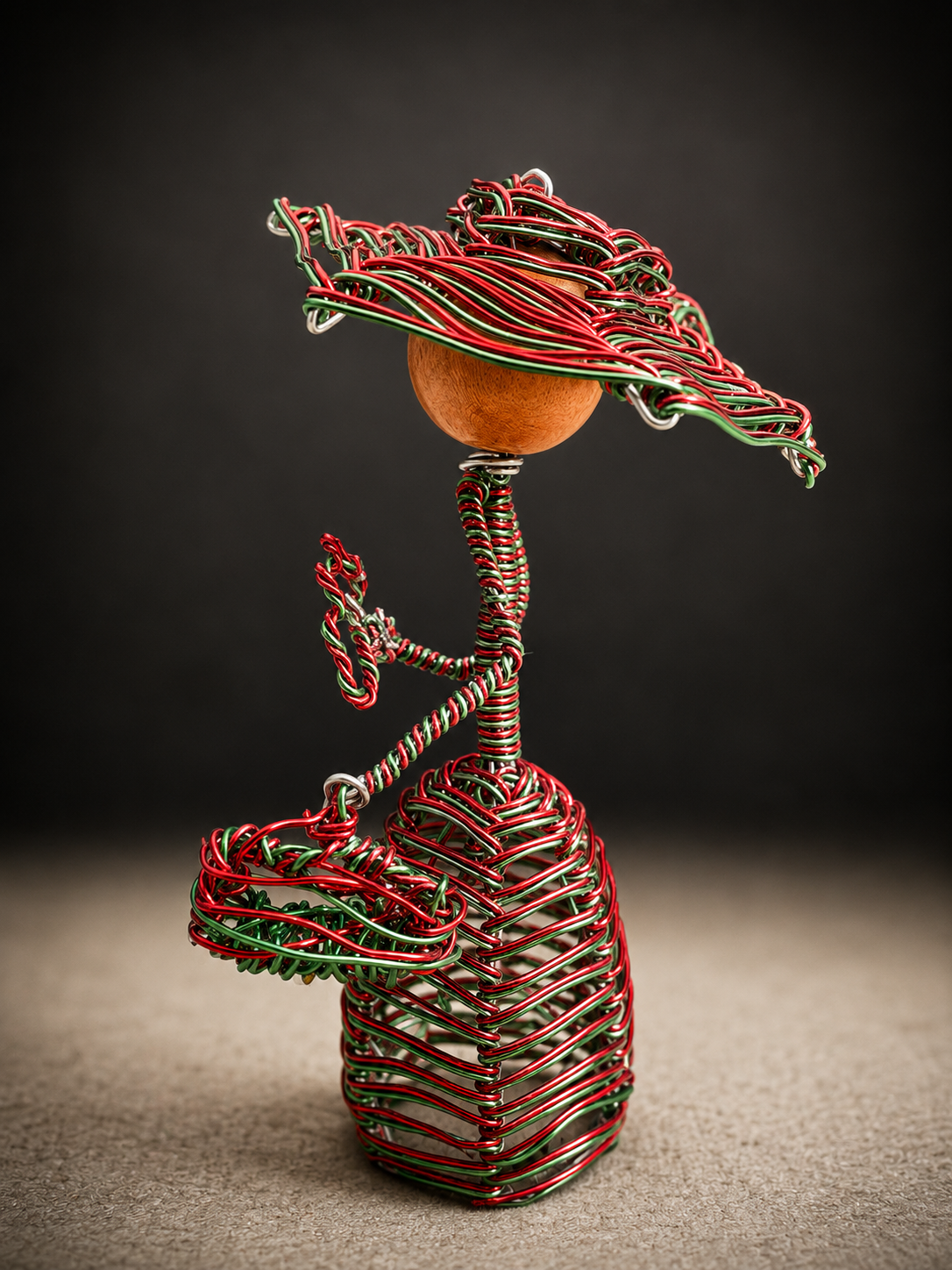 Edwardian-inspired wire sculpture figures with elegant vintage charm.”