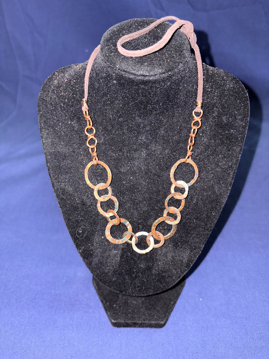copper circles inter linked to form a beautiful necklace