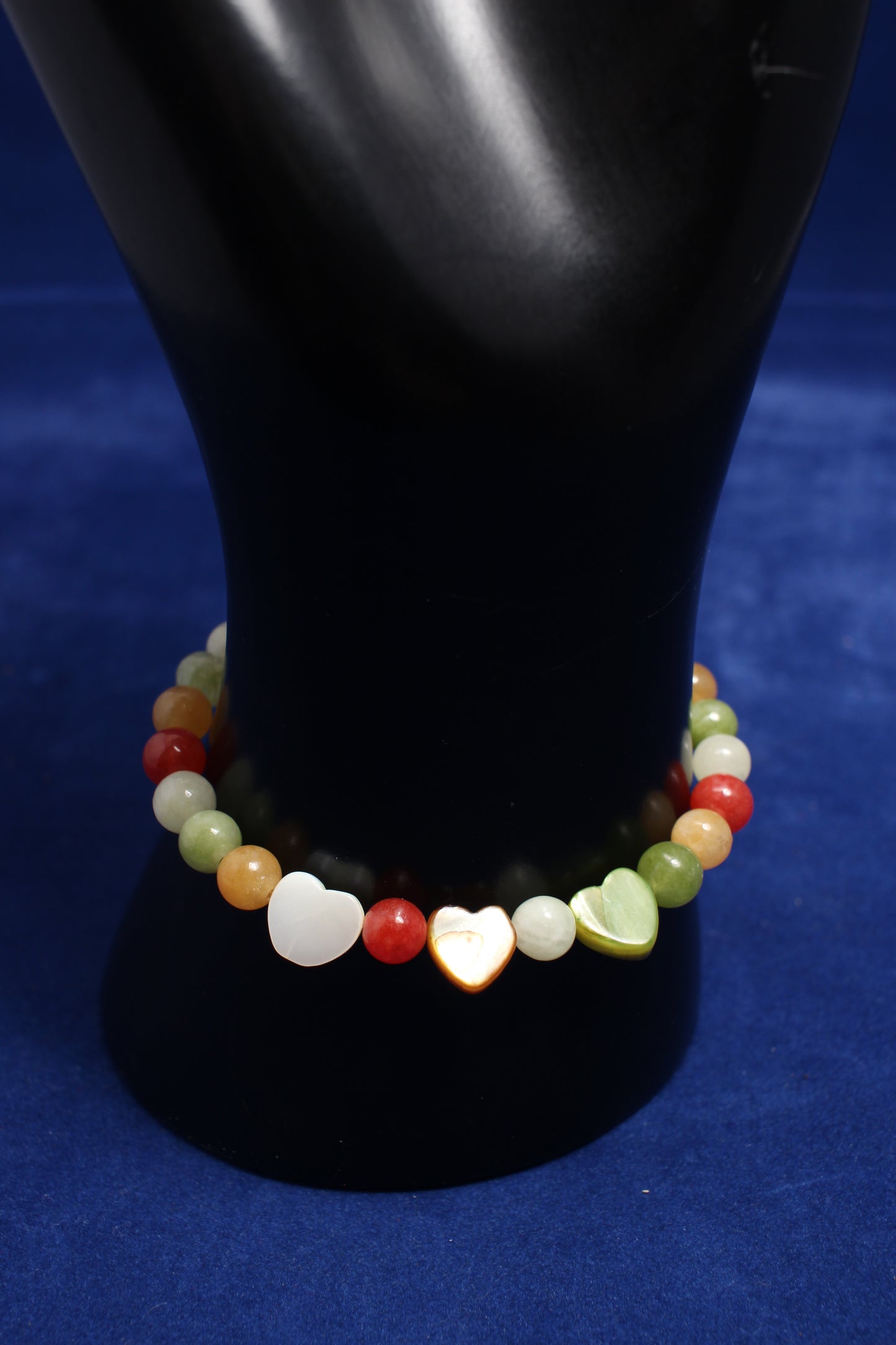 6mm mixed gemstone with 3 love heart to form focal piece elasticated bracelet