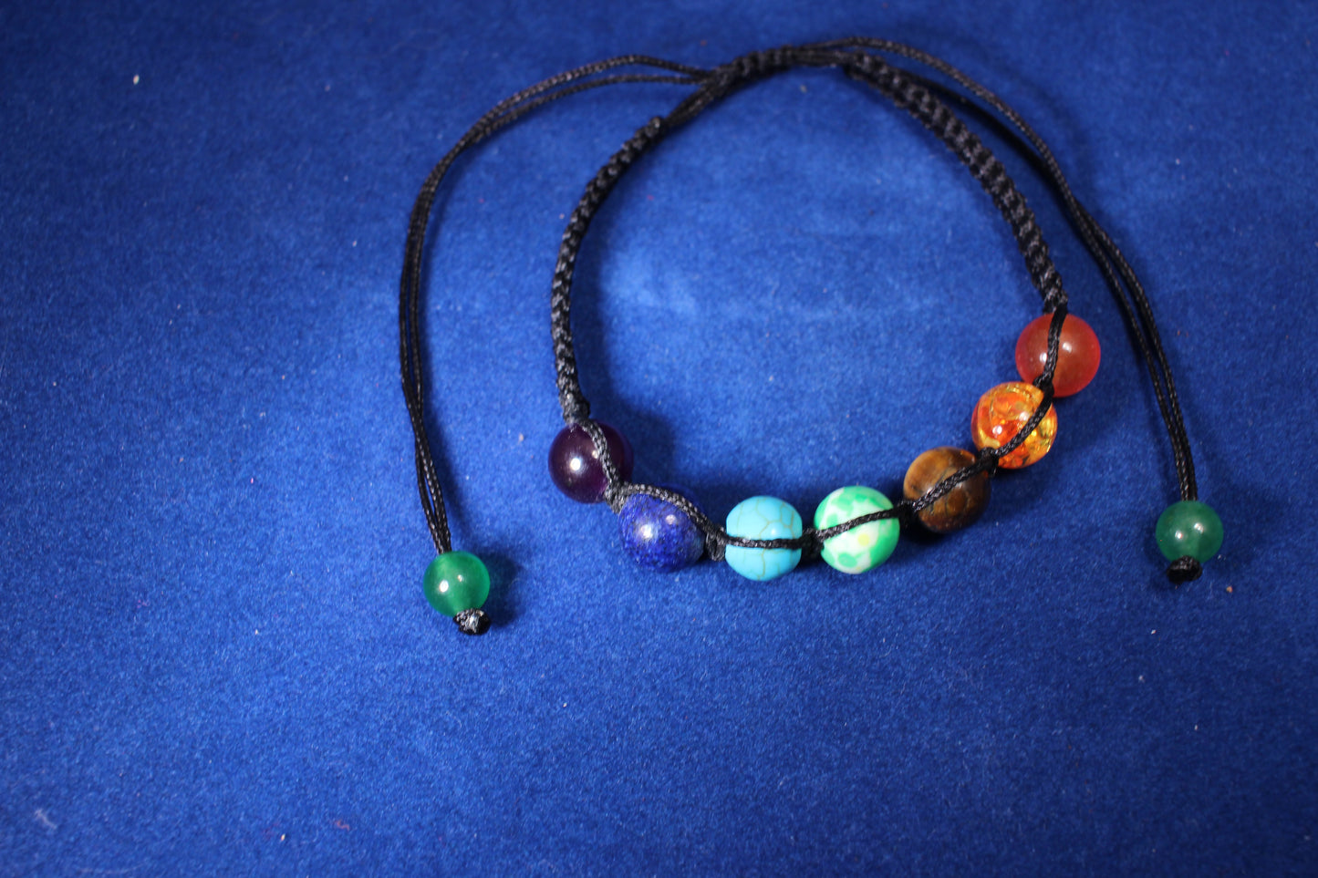 8mm with round shakra beads with black woven adjustable cord bracelet