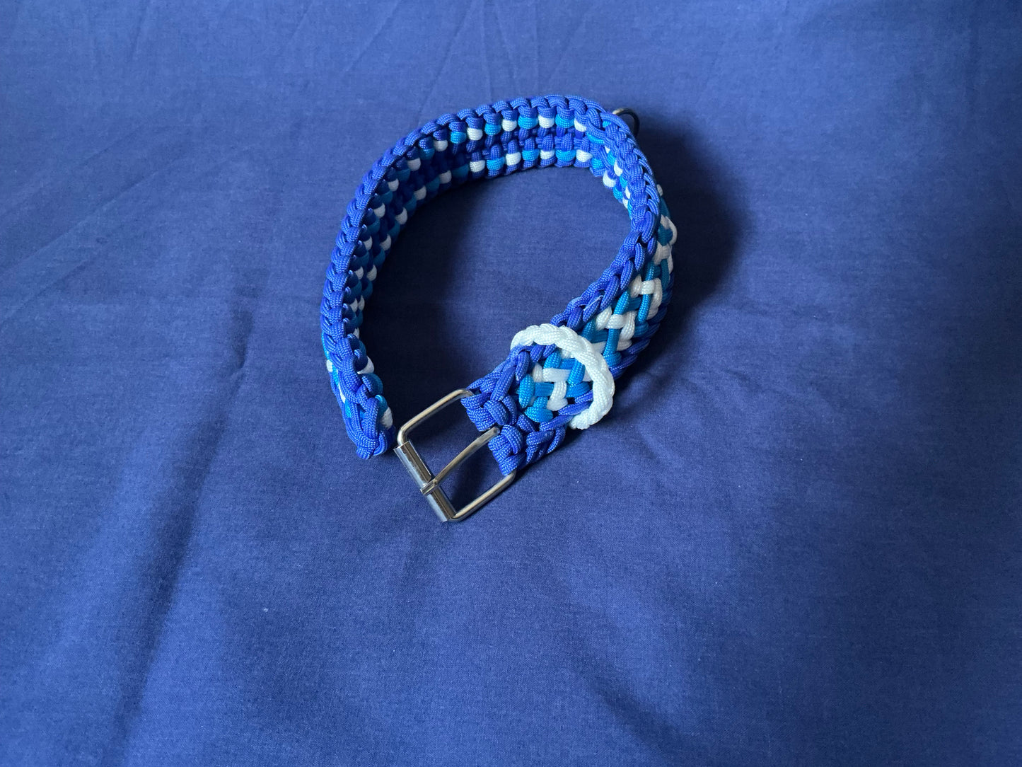 1.5” wide 19” long Light & Dark Blue, with white Crown Tail Paracord Adjustable Dog Collar.