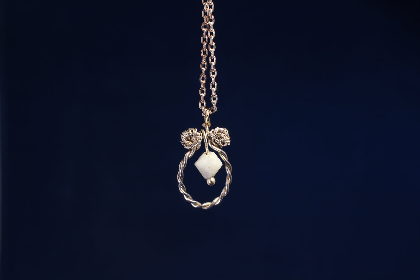 Sterling Silver Dangling Pendant with Green Quartz Chime Design