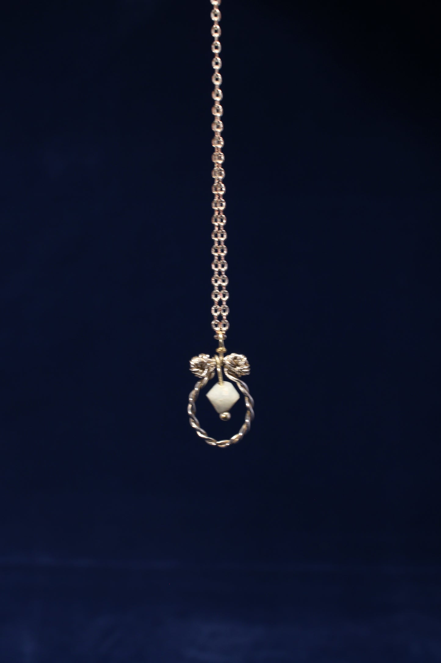 Sterling Silver Dangling Pendant with Green Quartz Chime Design