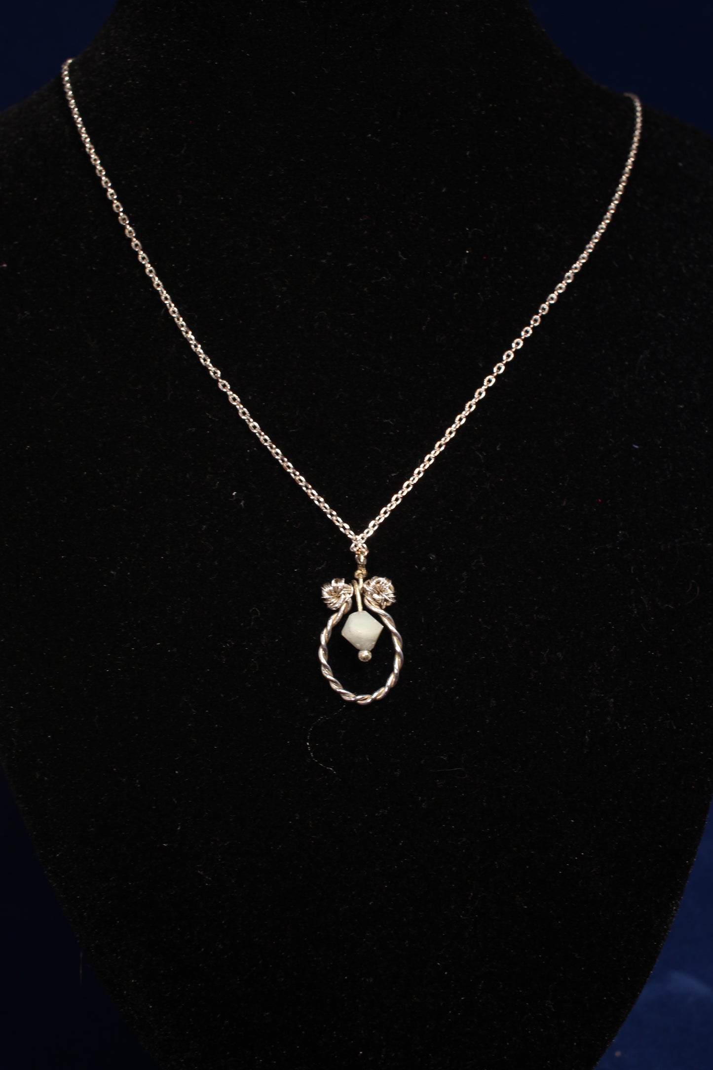 Sterling Silver Dangling Pendant with Green Quartz Chime Design