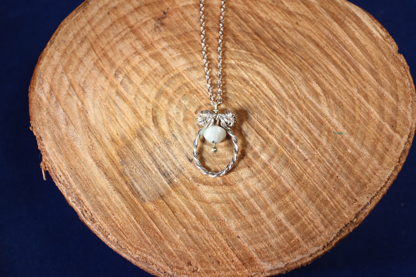 Sterling Silver Dangling Pendant with Green Quartz Chime Design